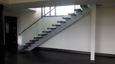 single stringer stair, glass guards, Iron stairs, steel stringers, floating stairs