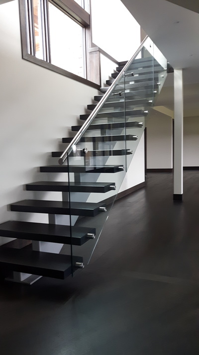 single string stair, glass
railing, Iron stairs, steel stringers, floating stairs